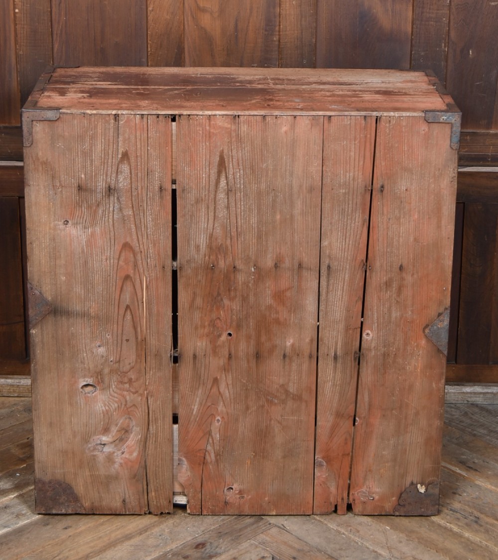 A Japanese tansu wooden chest featuring multiple drawers, sliding louvered doors, a small lockable door, and dark iron corner plates and drop handles. View XI