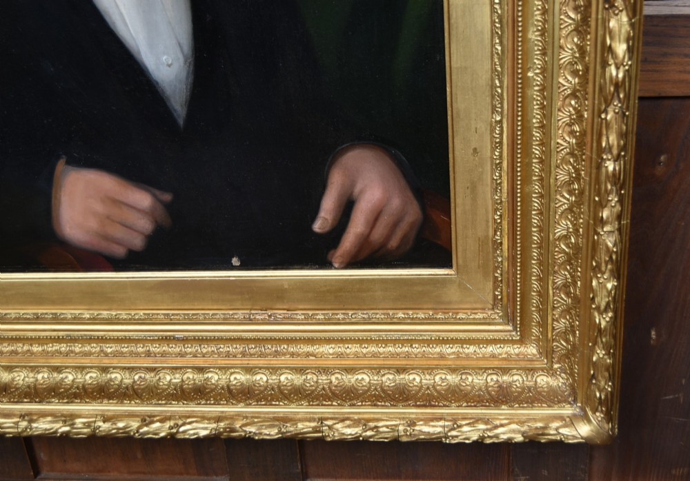 A nineteenth-century oil painting on canvas depicting a seated gentleman wearing a black jacket and white shirt, housed within a gilded wooden frame. View III