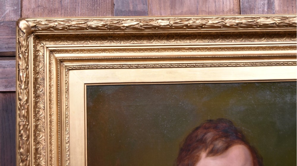 A nineteenth-century oil painting on canvas depicting a seated gentleman wearing a black jacket and white shirt, housed within a gilded wooden frame. View V