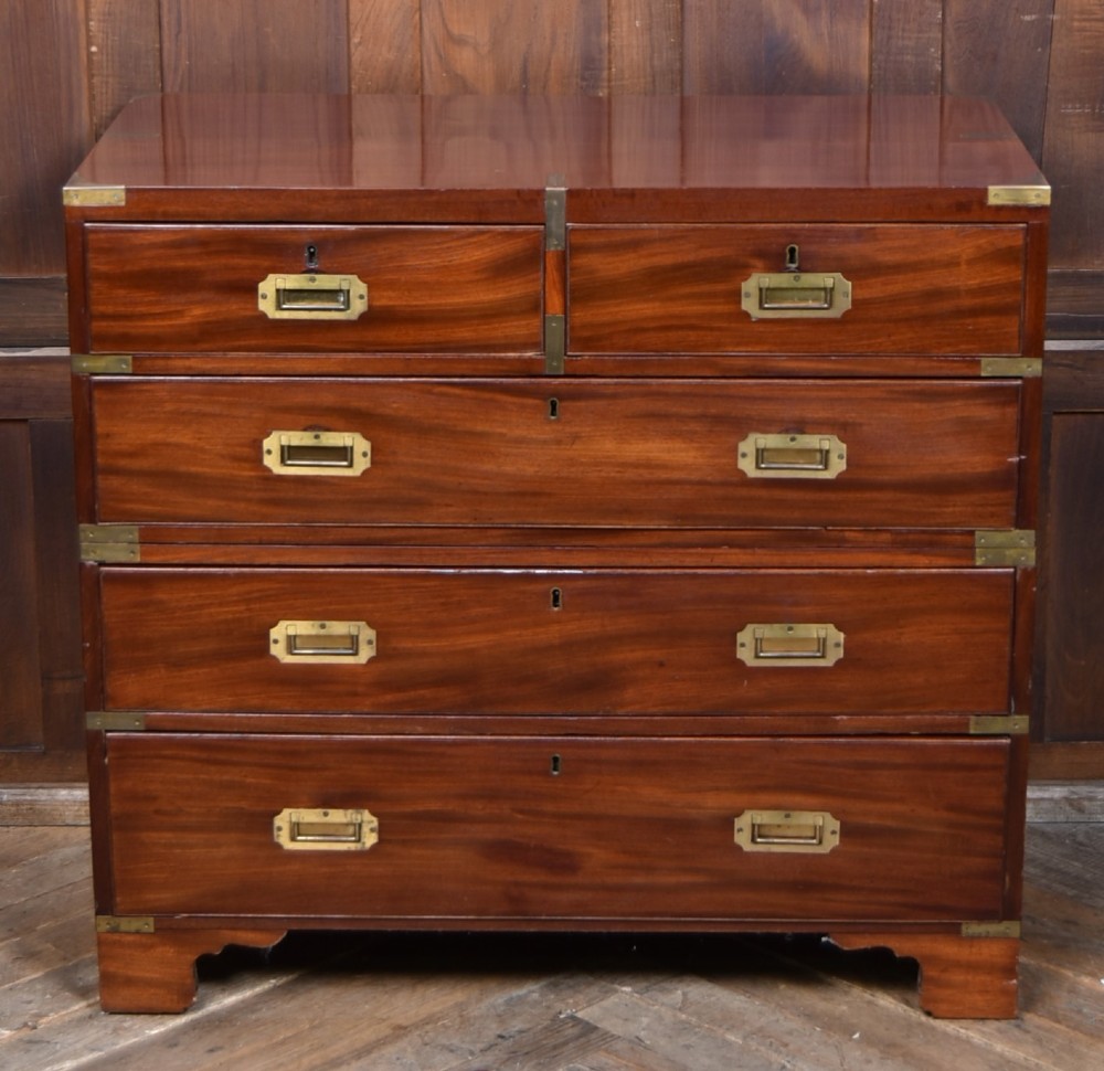 A 19th-century mahogany campaign chest of drawers featuring flush brass handles, corner brackets, and a two-section design. View II