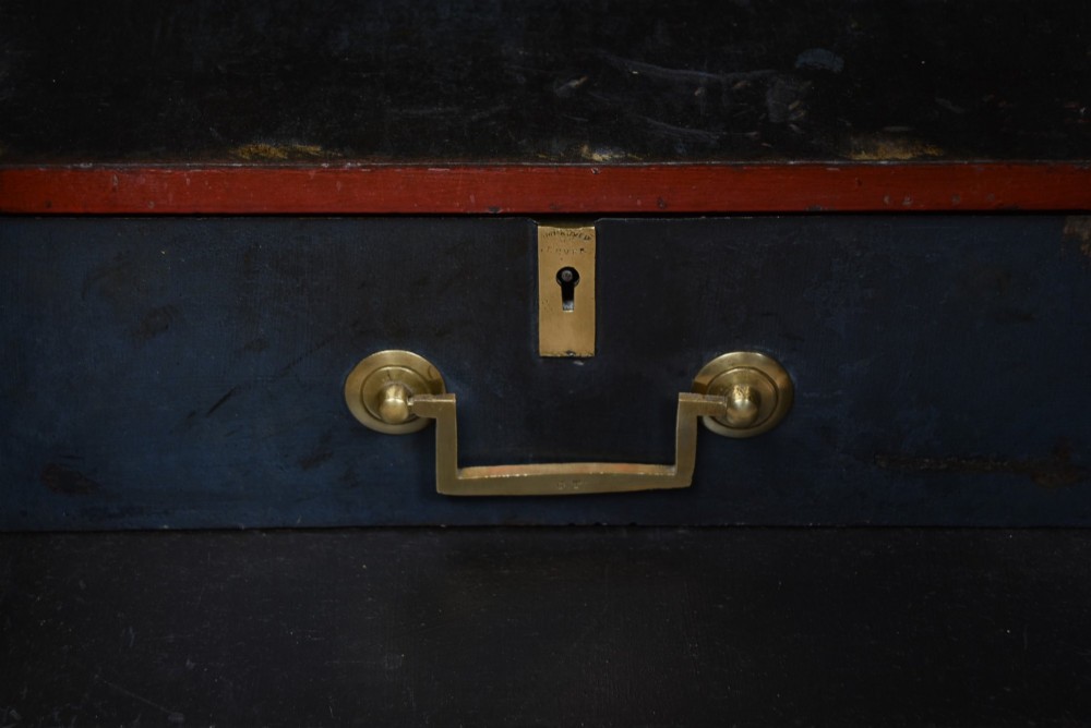 A heavy black painted iron safe featuring a rectangular body, a brass maker plaque for James Bruce of Glasgow, a faceted brass handle, and a brass fire-resisting emblem. View VIII