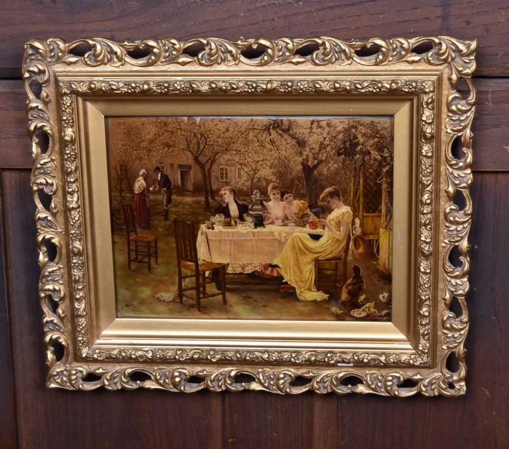 A pair of 19th-century framed crystoleum prints depicting figurative genre scenes, set inside deeply carved gilt frames. View II