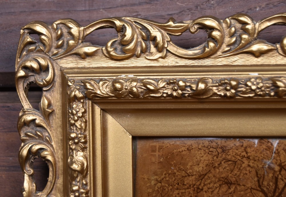 A pair of 19th-century framed crystoleum prints depicting figurative genre scenes, set inside deeply carved gilt frames. View VI