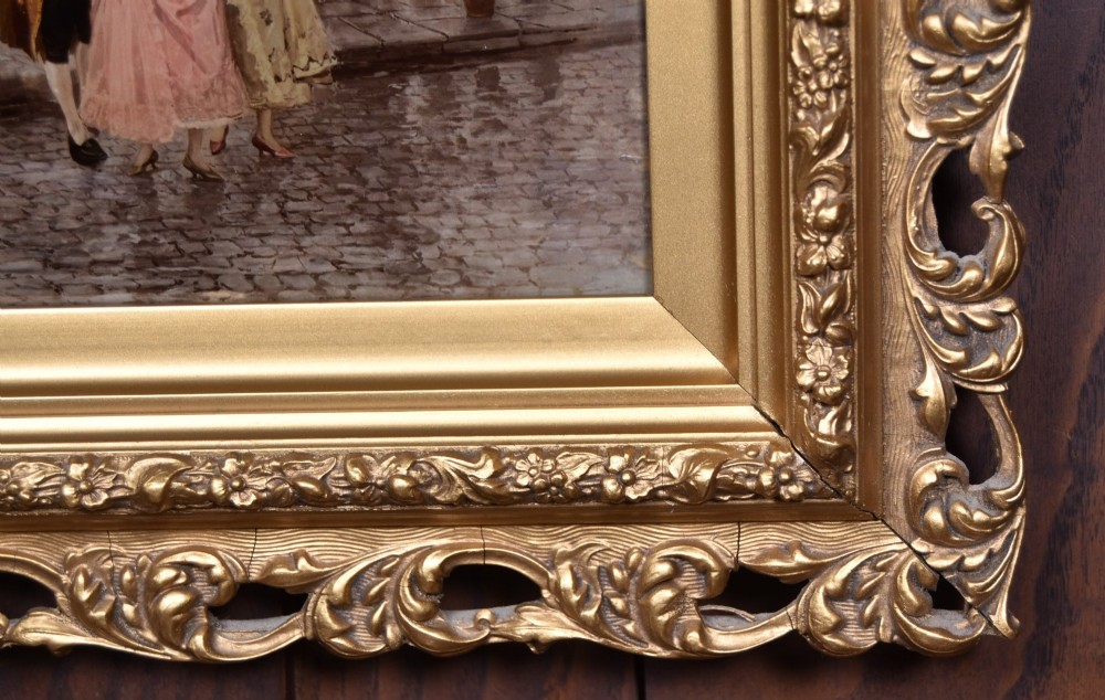 A pair of 19th-century framed crystoleum prints depicting figurative genre scenes, set inside deeply carved gilt frames. View XIV