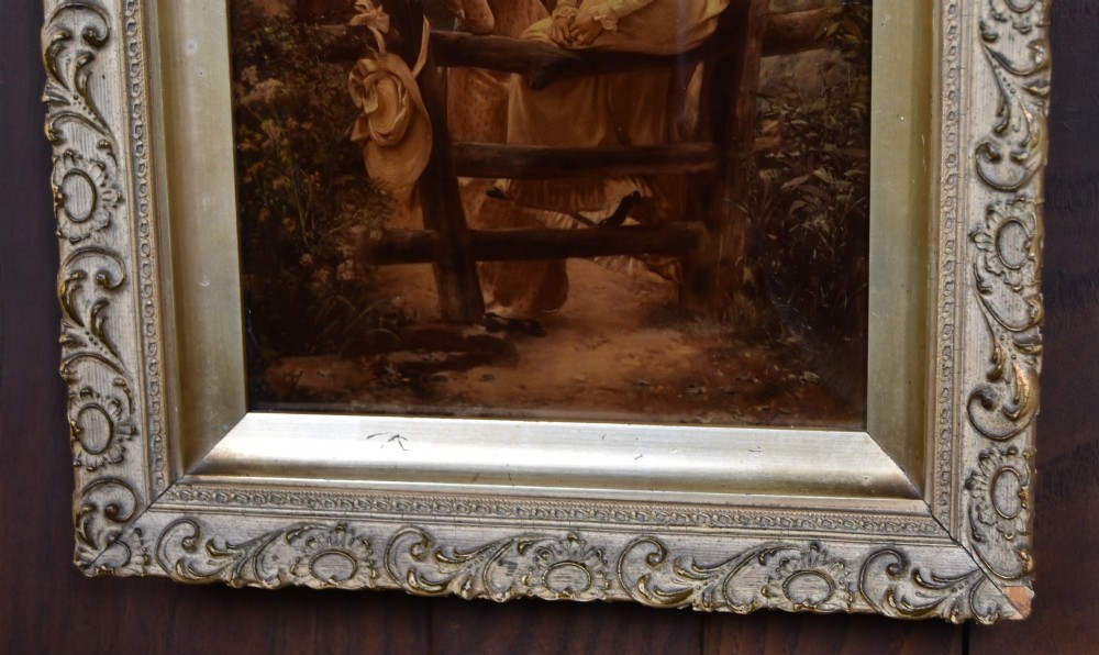 A 19th-century Victorian crystoleum picture depicting figures at a countryside fence, presented in an ornate gilt frame. View IV