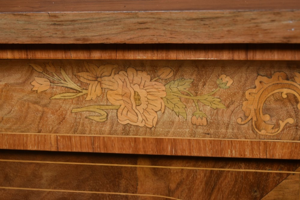 A Victorian walnut pier cabinet featuring double glazed arched doors, floral marquetry inlay, and decorative ormolu mounts. View V