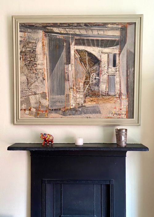 fig 2. A mid-century French modernist oil painting on canvas depicting a rustic barn interior and exterior structure in muted grey and neutral tones, housed within a painted light grey wooden frame.