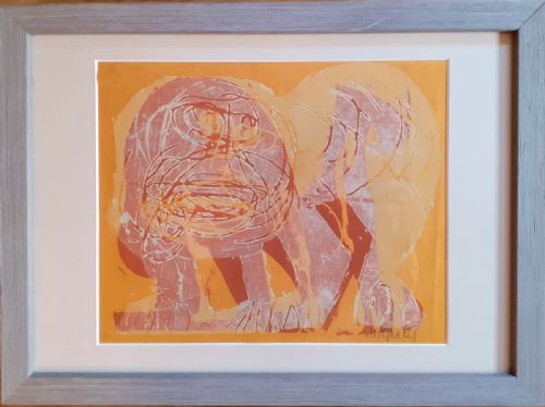 fig 2. A mid-century expressionist colour woodcut print depicting a stylised lion in terracotta red and orange hues on paper.