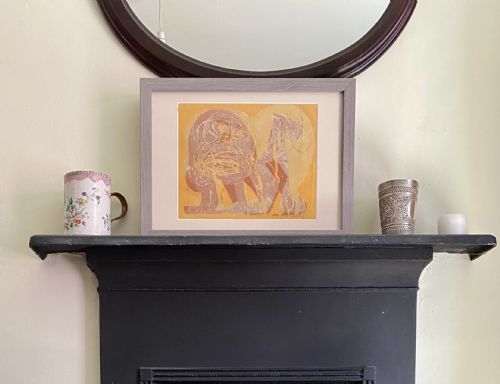 fig 3. A mid-century expressionist colour woodcut print depicting a stylised lion in terracotta red and orange hues on paper.
