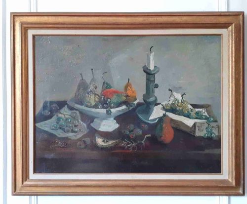 fig 1. A mid-century French modernist oil painting on canvas depicting a ceramic bowl with pears, bunches of grapes, and a candlestick on a table against a textured grey background.