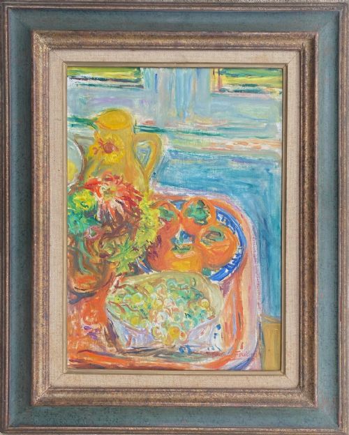fig 1. A mid-20th-century colourist still life oil painting on canvas depicting a yellow pitcher, fruit bowl, and vessel arranged on a table against a blue backdrop.