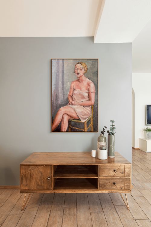fig 1. An oil painting on canvas depicting a seated 1920s woman with short bobbed hair wearing a pale pink slip dress against a muted grey background.