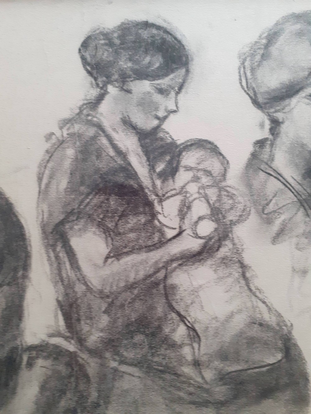 A monochrome charcoal drawing on paper featuring four separate figure studies of mothers holding infants. View II