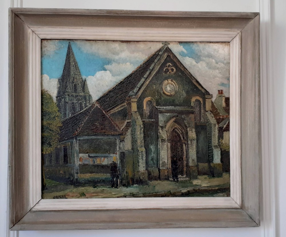 An oil painting on canvas depicting a Gothic stone church with a steeple under a cloudy sky, presented in a light grey wooden frame. View III