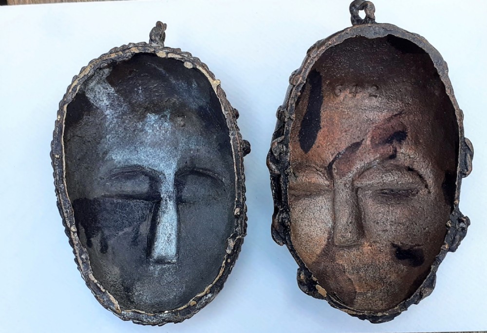 A pair of antique Ashanti African bronze miniature mask pendants, in lost wax technique, Ghana Africa View IV
