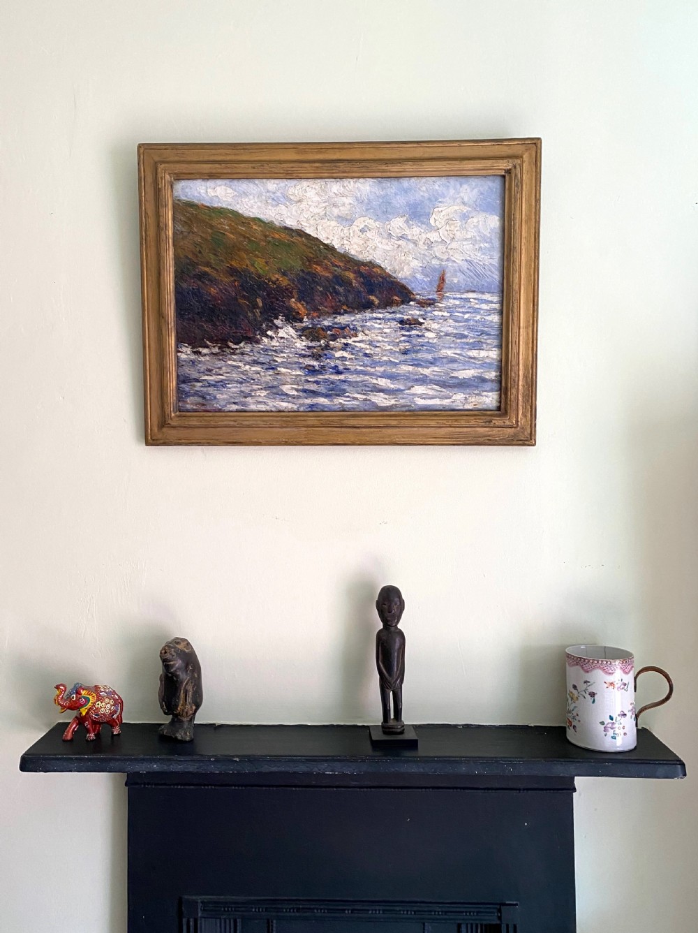 An impressionist oil painting depicting a grassy coastal cliff sloping into a choppy blue ocean with a lone sailing vessel in the distance under a cloudy sky. View III