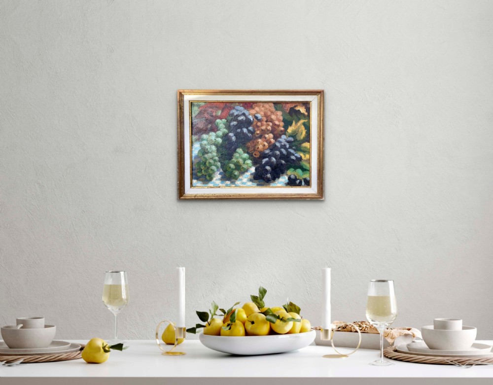 A 1930s Art Deco oil painting on canvas depicting clusters of green, black, and amber grapes resting on a blue and white chequered tablecloth. View IX