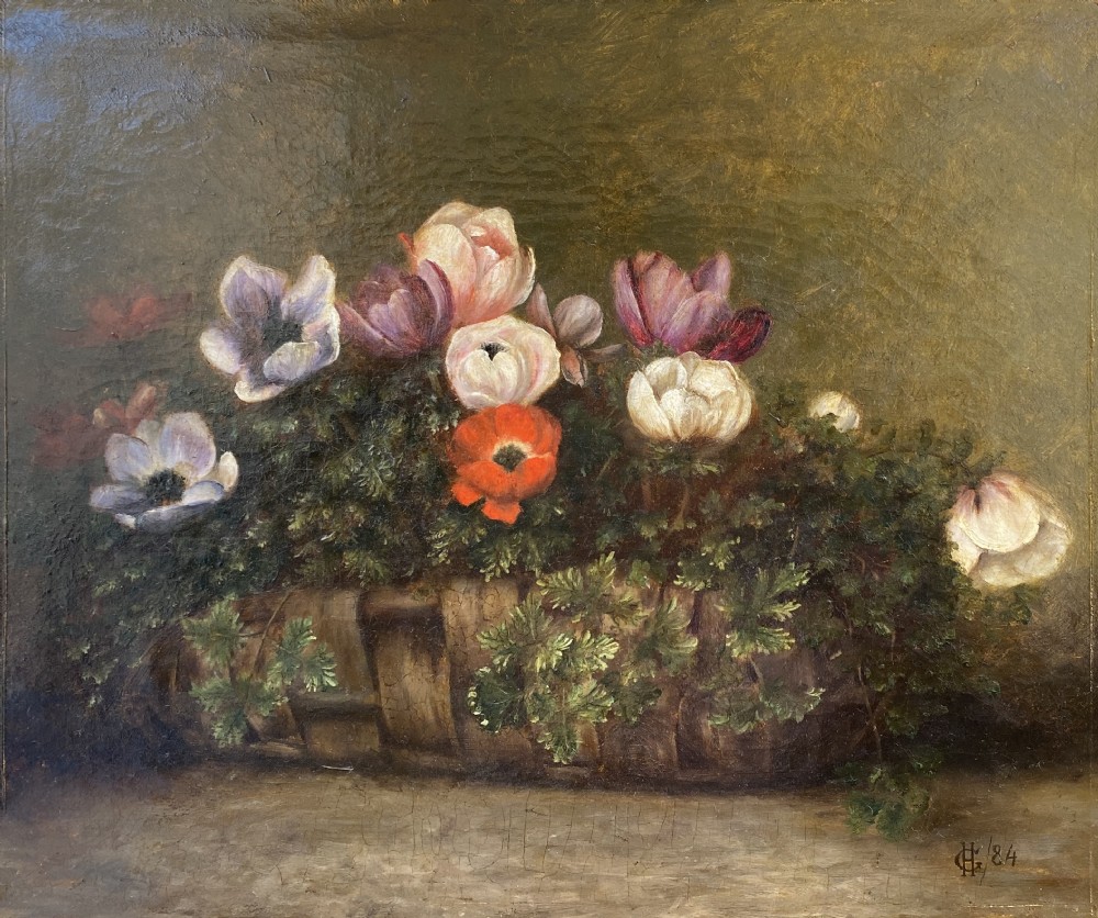 A 19th-century oil painting depicting colourful anemone flowers arranged inside a woven wicker basket against a dark background. View VII