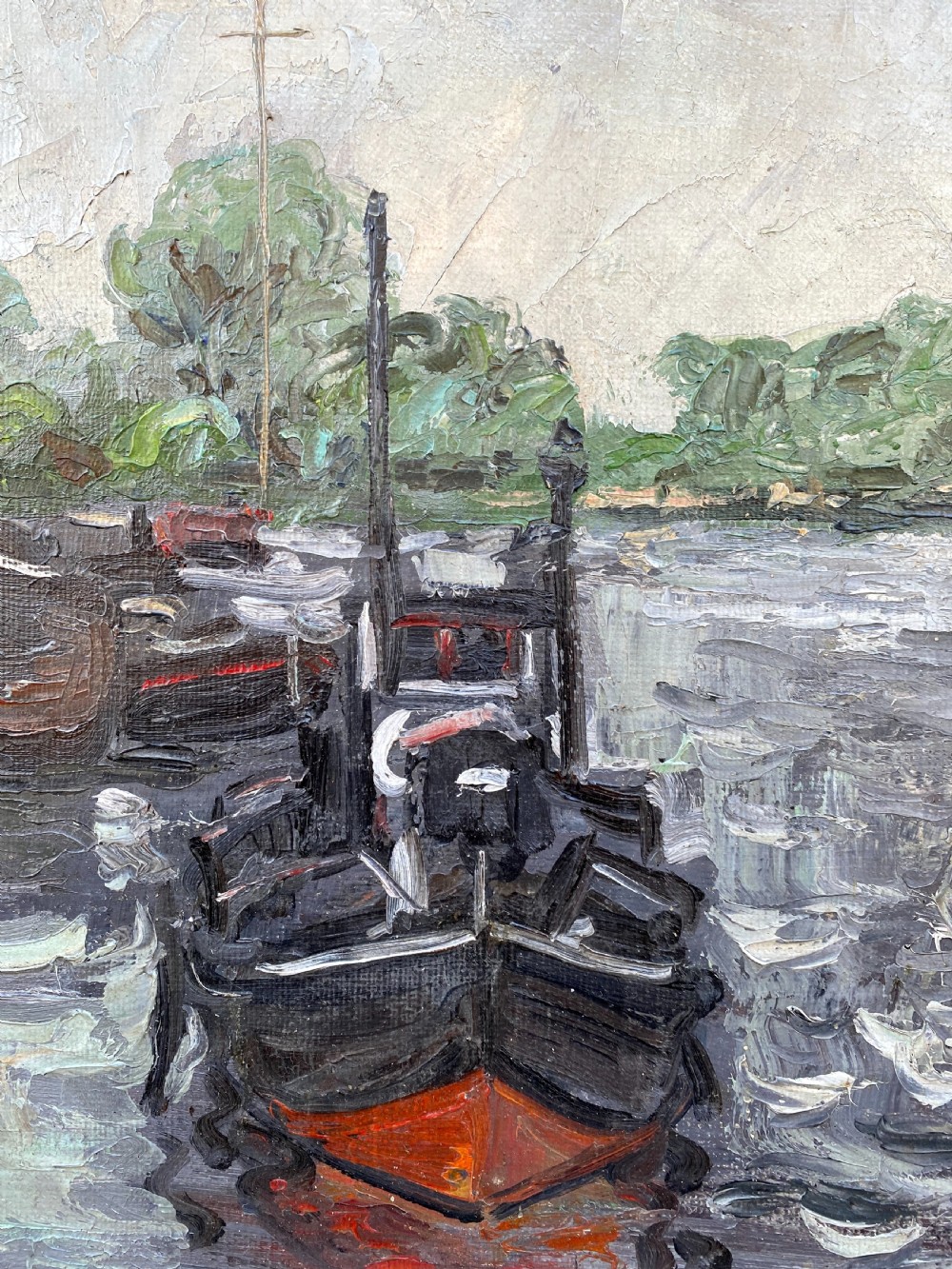 An oil on canvas painting featuring dark wooden barges docked along a riverbank with trees in the background. View III