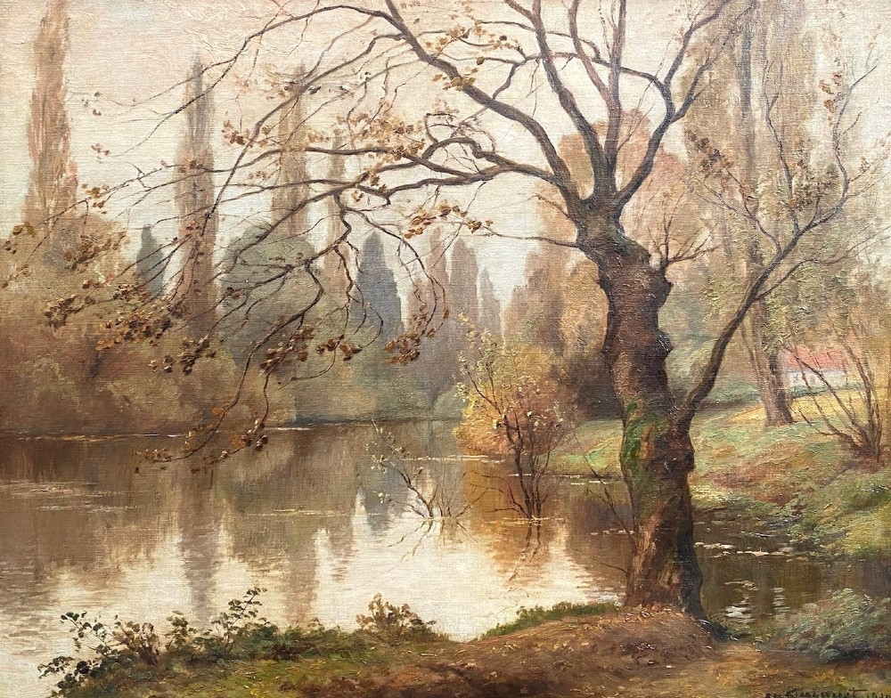 A 1930s French landscape oil painting on canvas depicting a lake bordered by bare trees and poplar foliage with a house visible in the background.