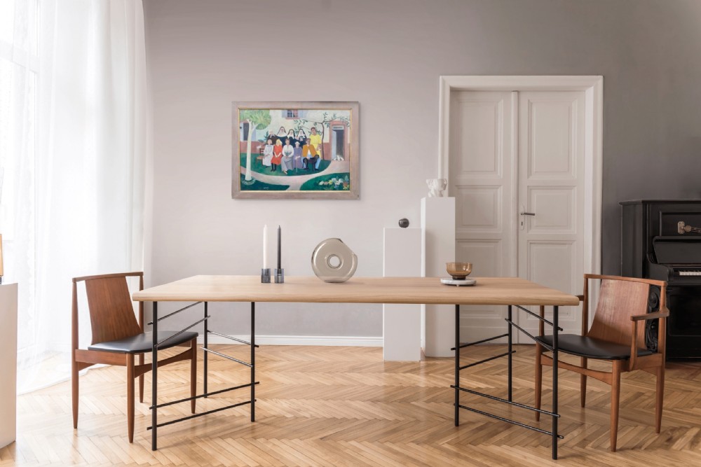 An oil painting on canvas depicting a figurative group portrait including nuns, figures, and a dog seated outside a white building. View X