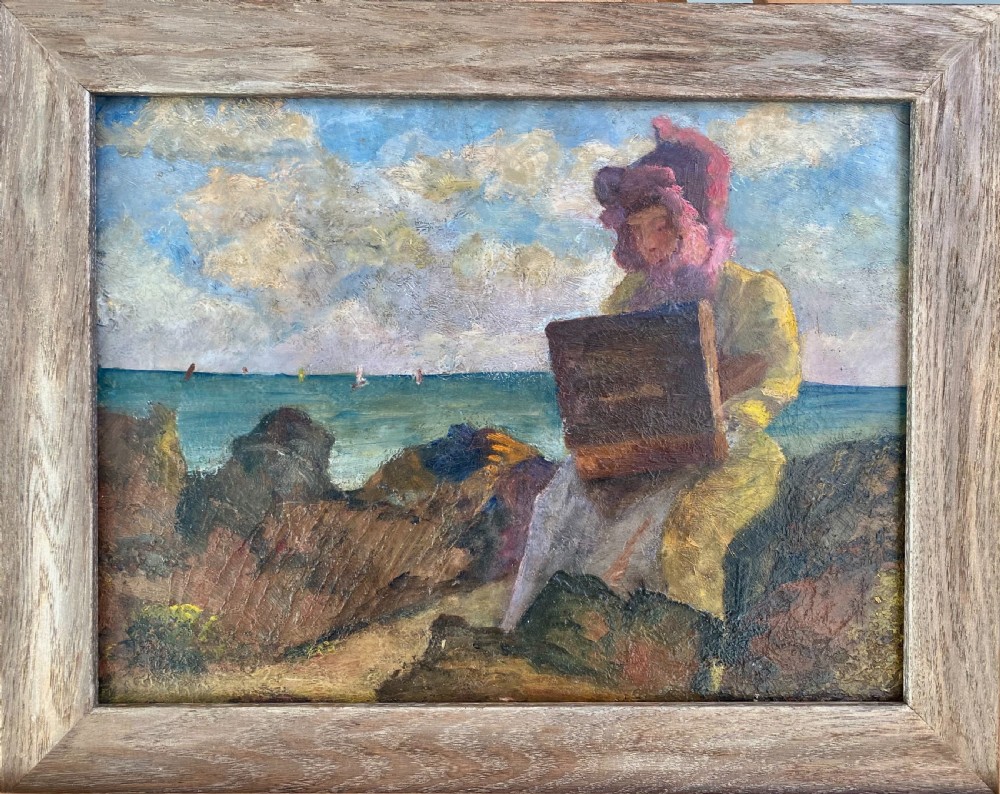 An Impressionist oil painting depicting a female artist in a pink bonnet sitting on coastal rocks while painting a seascape outdoors. View II