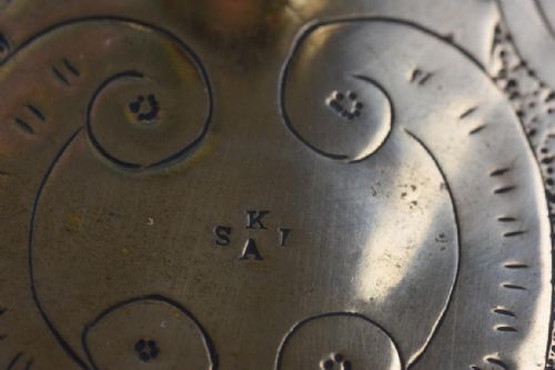 AN UNUSUAL ARTS AND CRAFTS BRASS CHAMBERSTICK BY THE KESWICK SCHOOL OF INDUSTRIAL ARTS - ADDITIONAL PHOTO 1