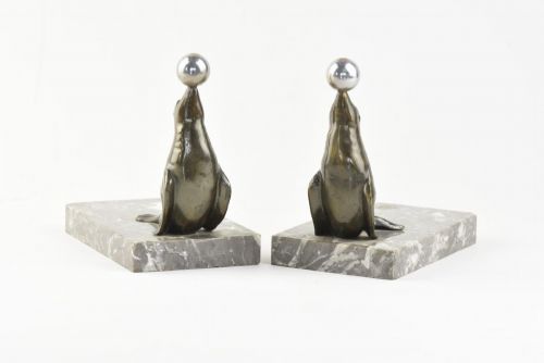 A PAIR OF ART DECO SEALION BOOKENDS - ADDITIONAL PHOTO 1