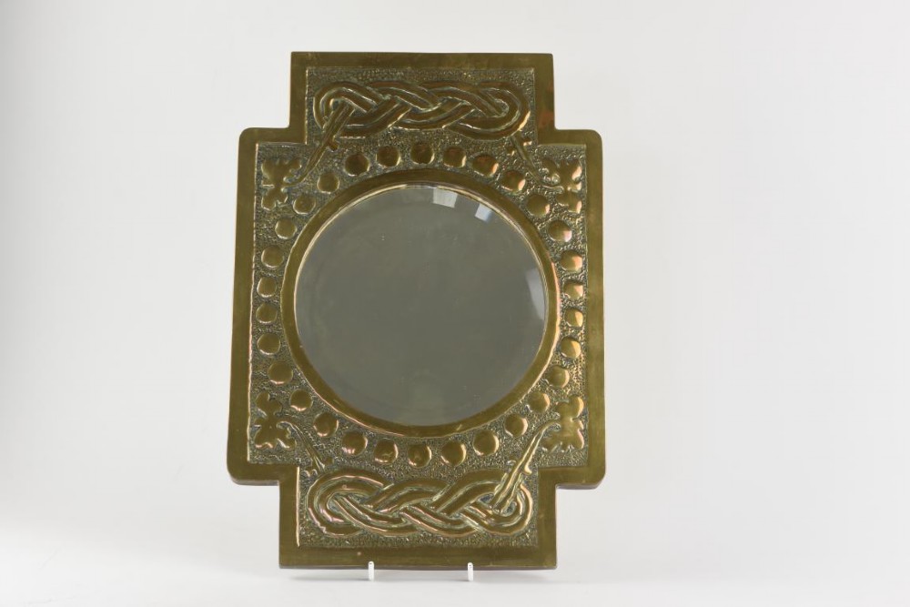 Scottish Arts and Crafts brass mirror.