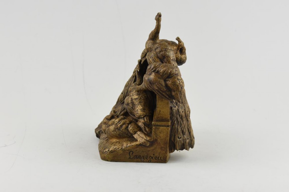 A French Art Nouveau patinated bronze sculpture depicting five peacocks perched around a carved balustrade. View II