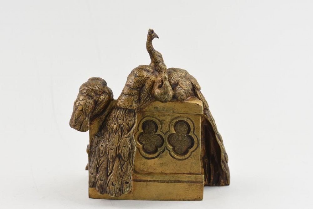 A French Art Nouveau patinated bronze sculpture depicting five peacocks perched around a carved balustrade. View III