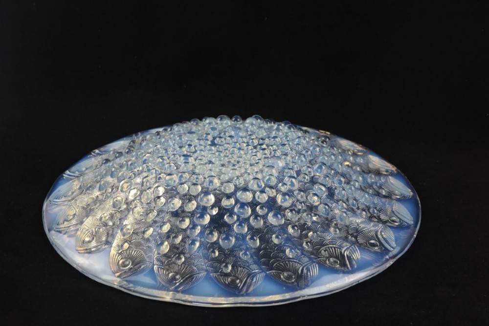 An Art Deco opalescent glass bowl featuring molded fish motifs surrounding raised water bubble patterns. View II