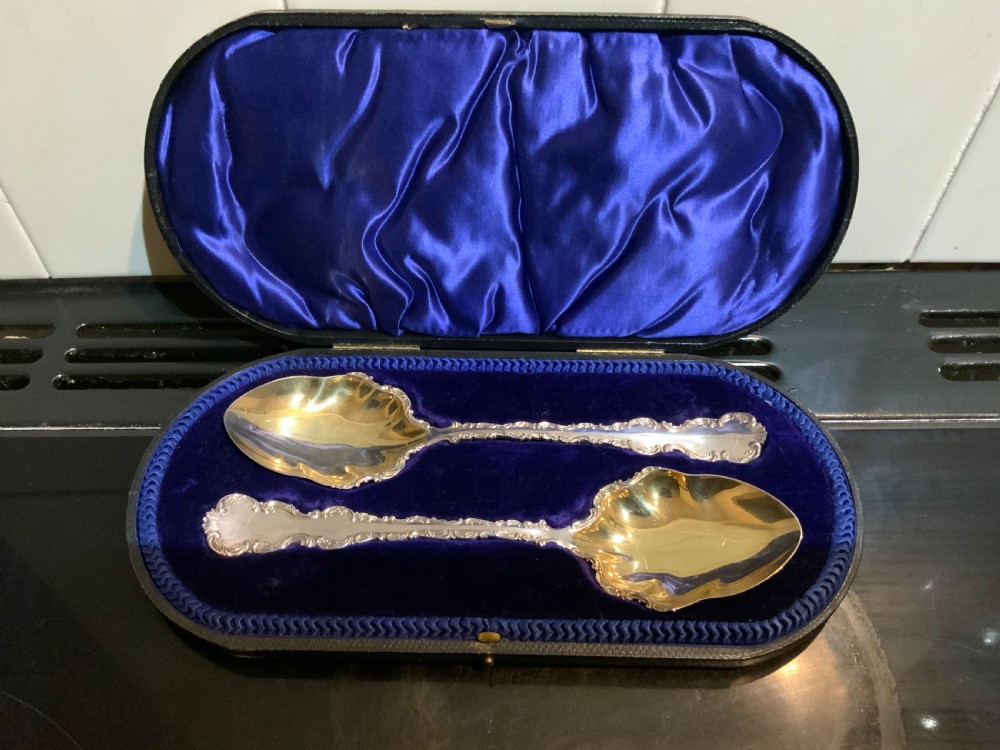 Silver & Gilt Pair of Serving Spoons in their original Case