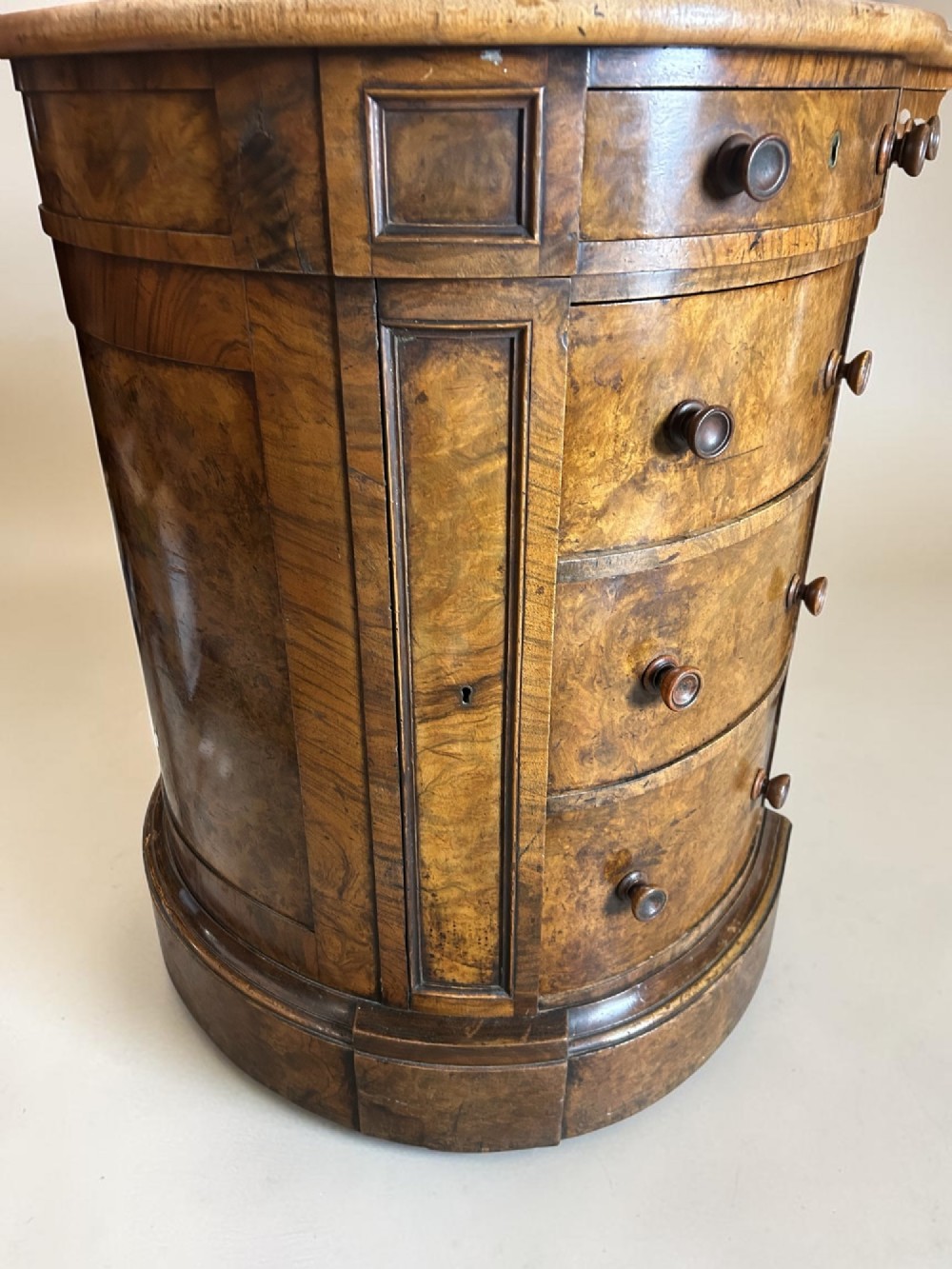A 19th-century freestanding kidney-shaped desk crafted from warm brown burr walnut with a dark leather inset top and dual drawer pedestals. View VII