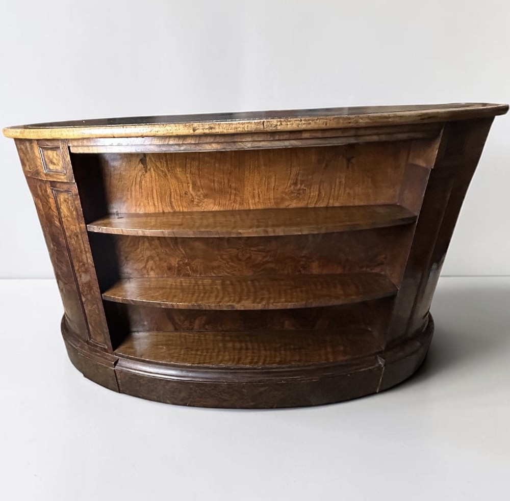 A 19th-century freestanding kidney-shaped desk crafted from warm brown burr walnut with a dark leather inset top and dual drawer pedestals. View XIII