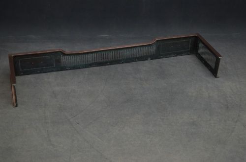 An antique Victorian copper fireplace fender featuring pierced vertical slots and side panels embellished with raised floral paterae and beaded edging. View VI