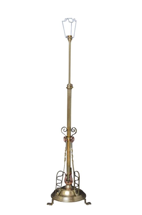 An Art Nouveau brass and copper standard lamp with a telescopic stem, scrolled metal base, and flared cream fabric shade. View IV