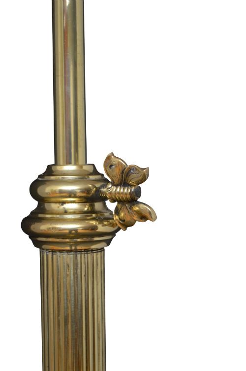 An Art Nouveau brass and copper standard lamp with a telescopic stem, scrolled metal base, and flared cream fabric shade. View VII