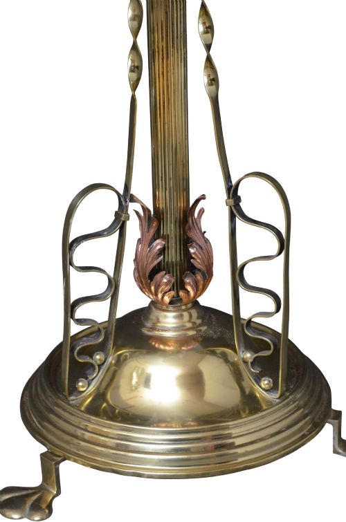 An Art Nouveau brass and copper standard lamp with a telescopic stem, scrolled metal base, and flared cream fabric shade. View VIII