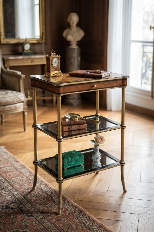 A French-style three-tier side table featuring a floral inlaid wooden top with a single drawer, fluted metal legs, and two lower mirrored shelves. View II