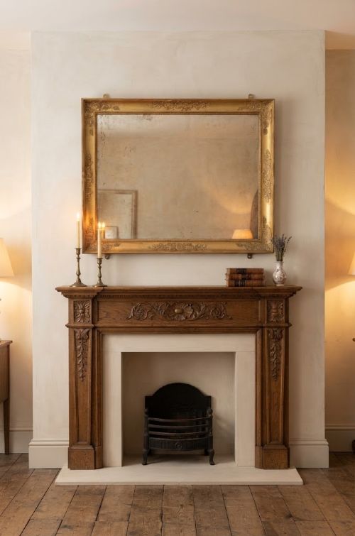 French Restoration Giltwood Wall Mirror with Mythological & Floral Carvings