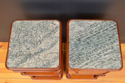 A pair of antique satinwood bedside cabinets with green marble tops, fluted turned legs, and decorative parquetry wood inlays. View VIII