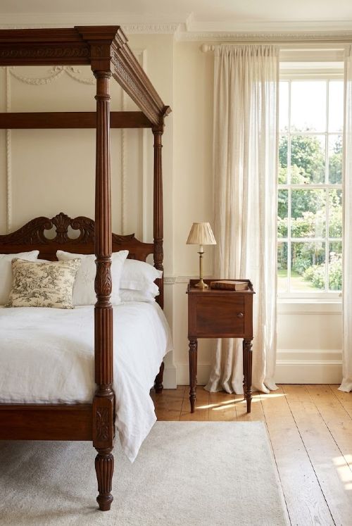 fig 2. A William IV mahogany nightstand featuring a gallery top, a single door cupboard with a turned wooden knob, and four slender reeded tapering legs.