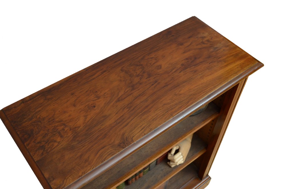 A low Victorian open bookcase crafted from walnut wood with three horizontal shelves. View IV