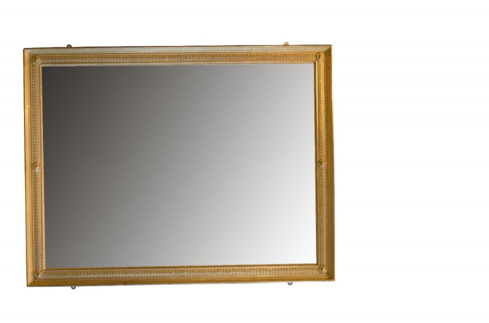 A large rectangular antique wall mirror featuring a carved giltwood frame decorated with detailed classical bead moulding and rosette bosses. View IV