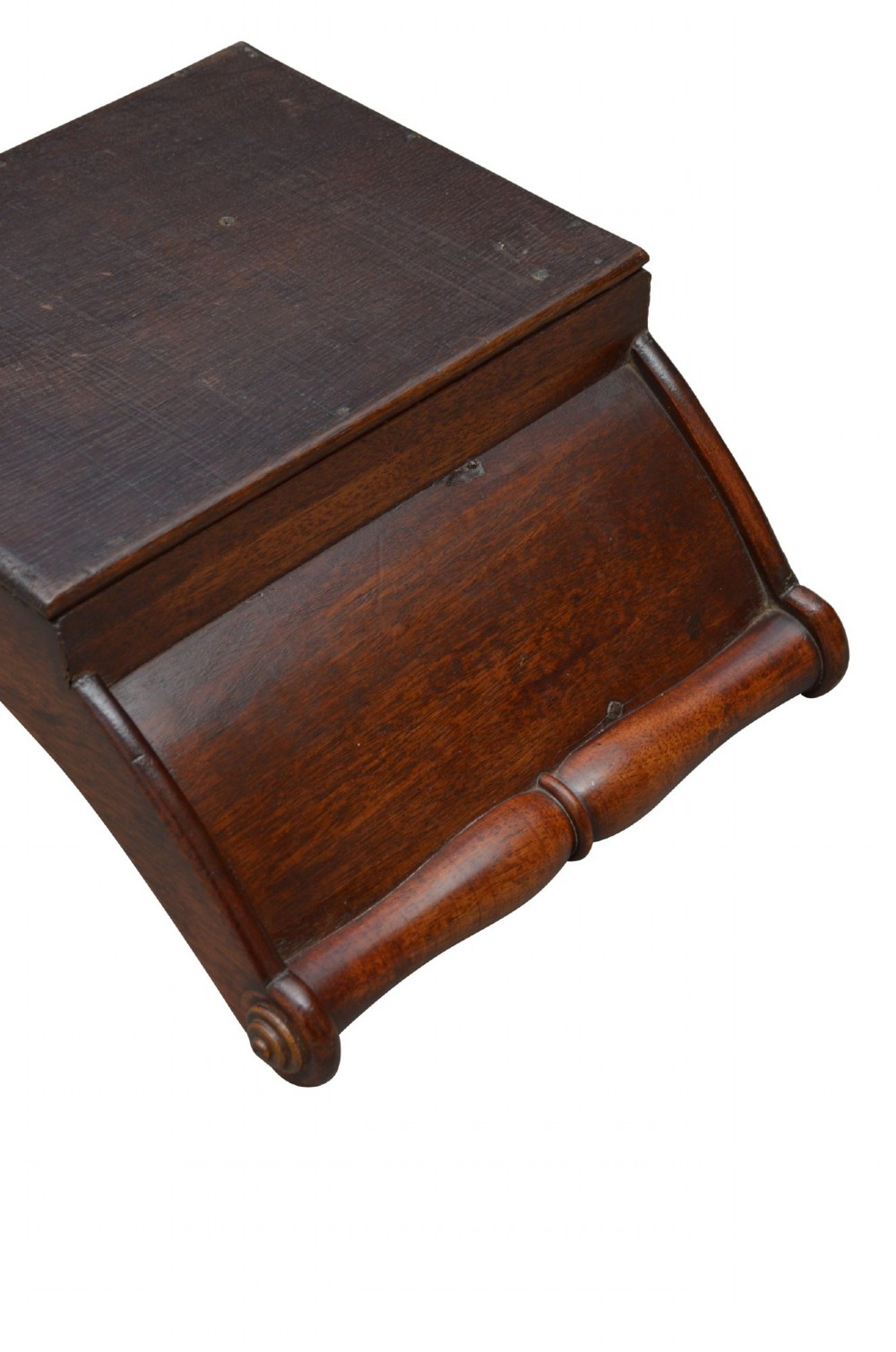 A Georgian mahogany cheese coaster displaying a crescent-shaped wooden body with carved scroll terminals and a central dividing partition. View VII