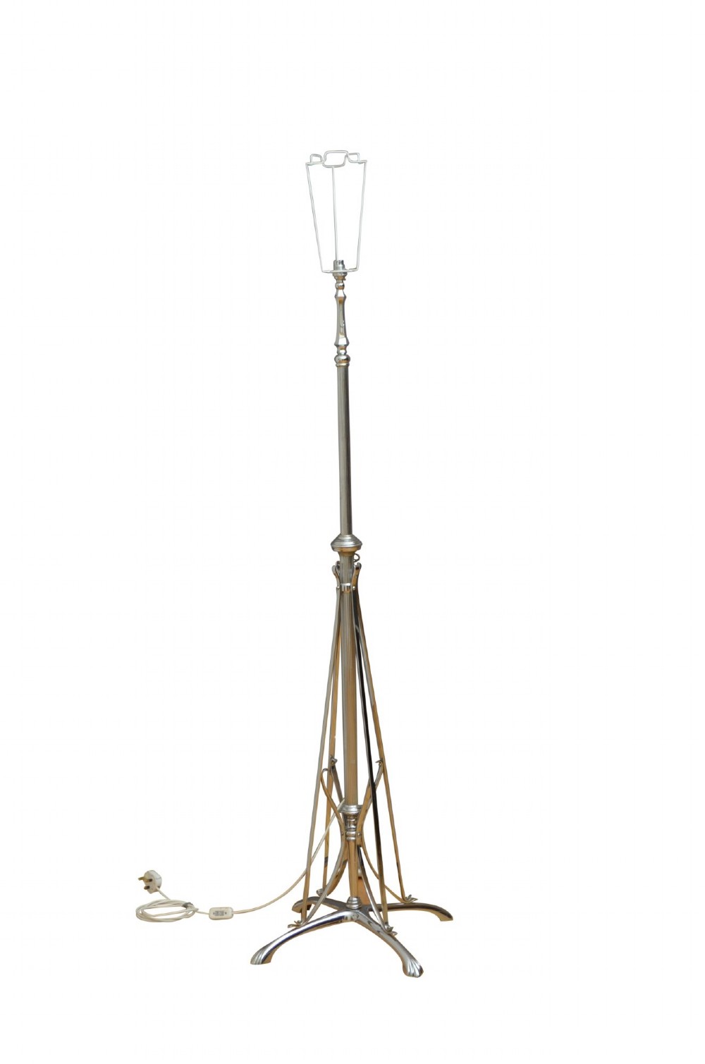 An Art Deco metal standard lamp featuring a fluted central stem, tripod sweeping base supports, and a scalloped white fabric shade. View II