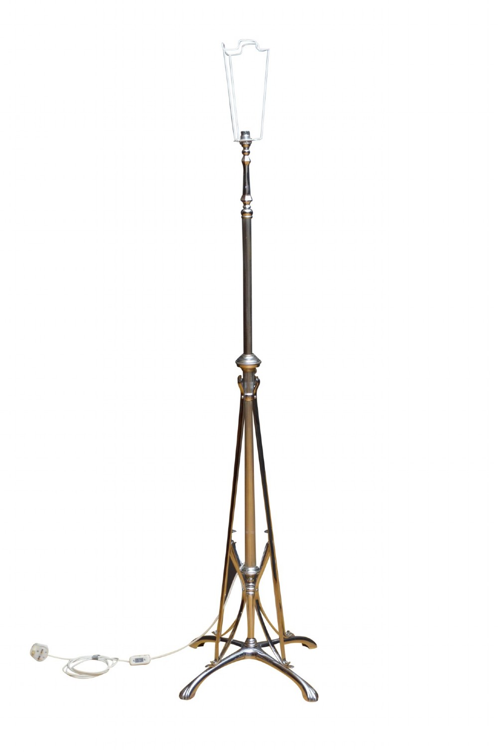 An Art Deco metal standard lamp featuring a fluted central stem, tripod sweeping base supports, and a scalloped white fabric shade. View III