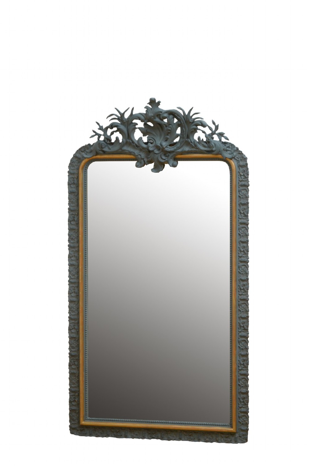 A tall rectangular wall mirror featuring a dark grey carved frame with a golden inner bead and an intricate foliage crest at the top.