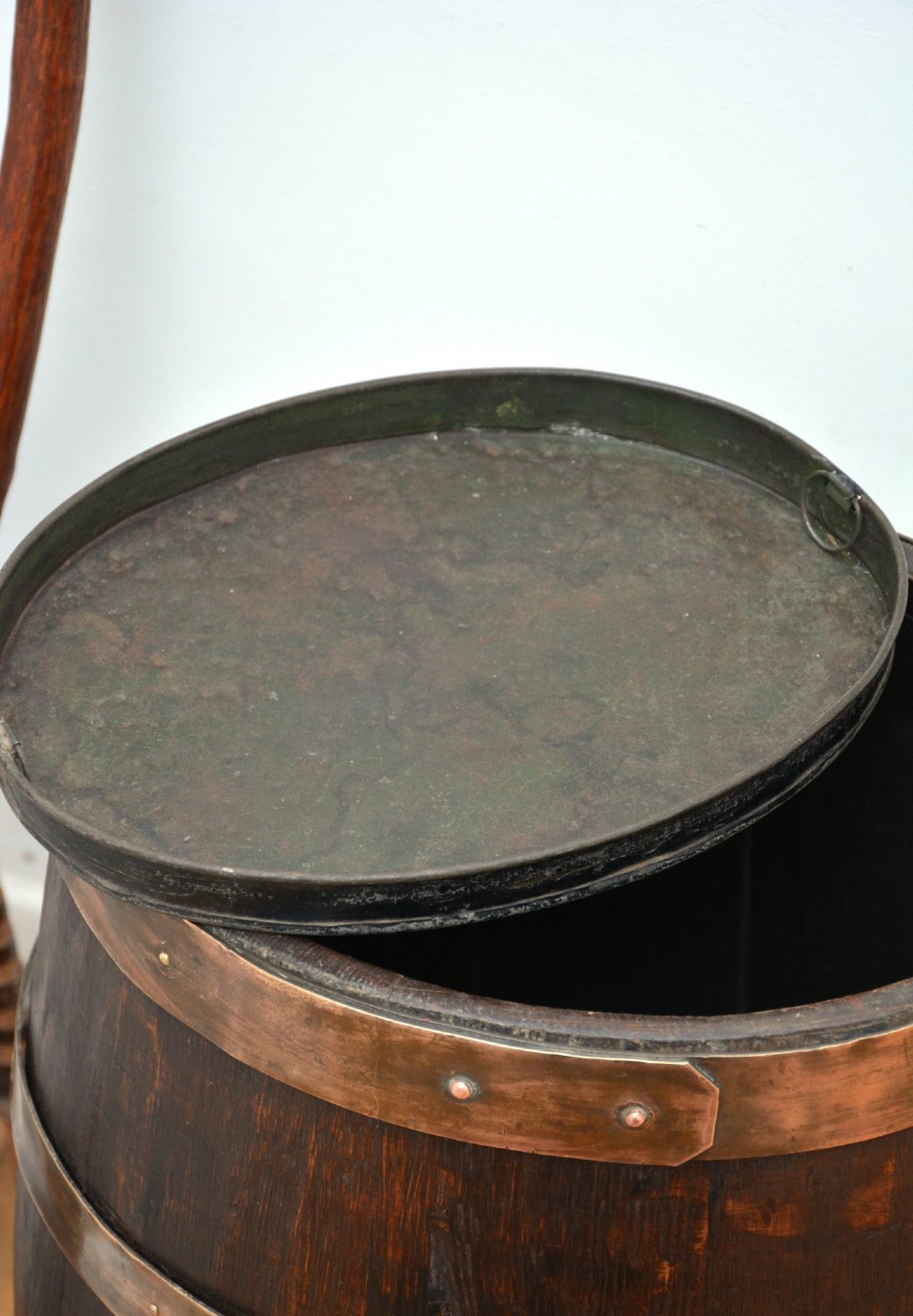 A Victorian dark oak coopered barrel umbrella stand with polished metal binding hoops. View XI